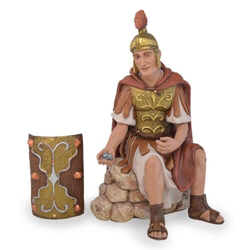 Soldado romano sentado con dinares y escudo